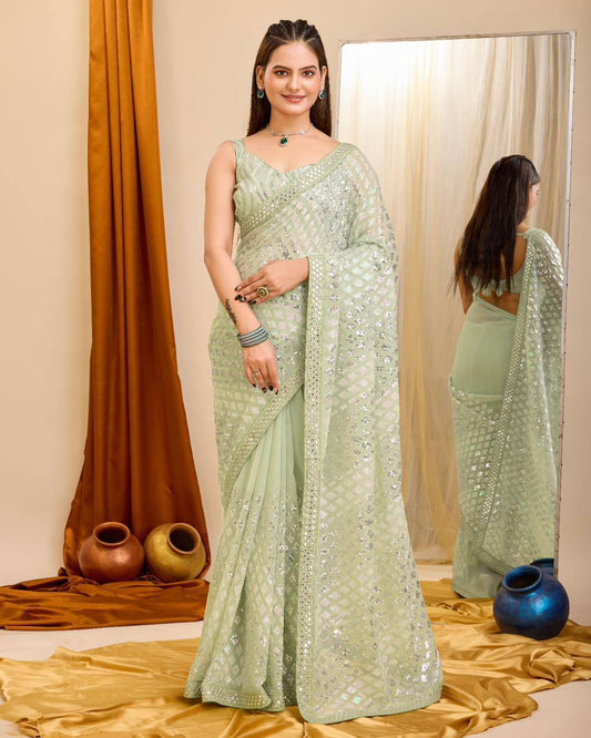 Peaceful Georgette Embroidery With Piping Work Pista Color Saree