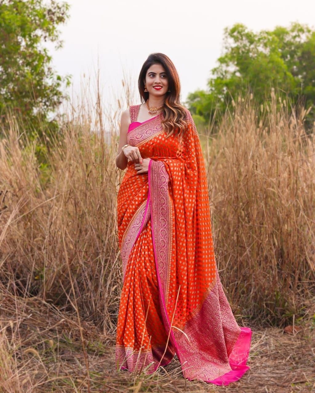 Luxuriant Jaquard Orange Color Silk Saree