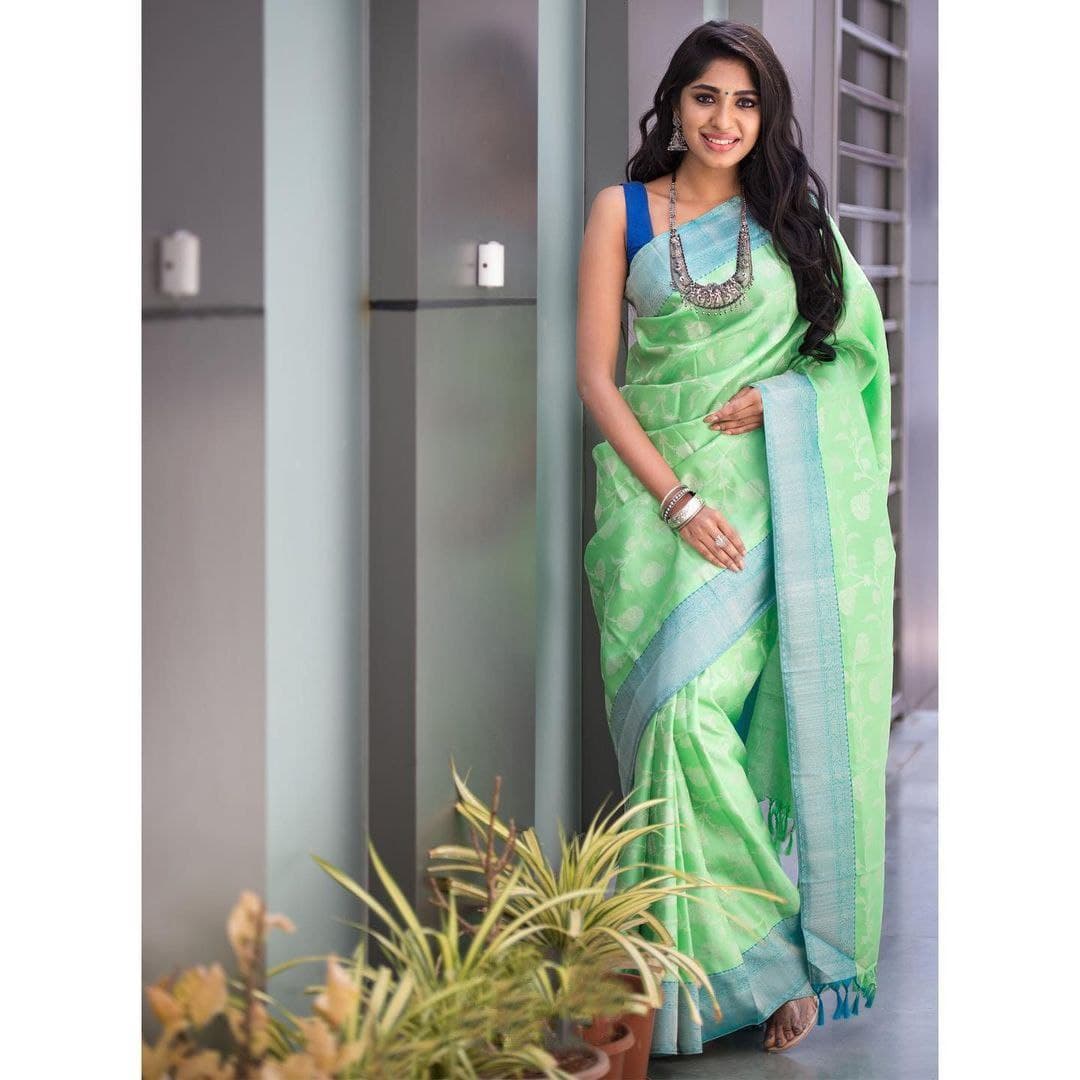 Luxuriant Jaquard Firozi Color Silk Saree