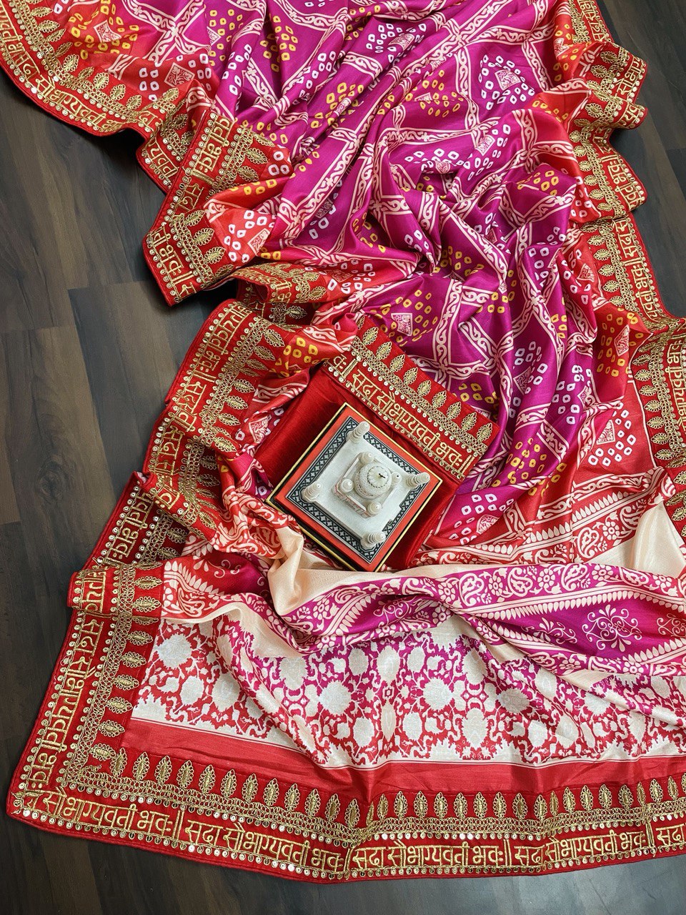 Admiring Bandhani Silk Pink Color Saree