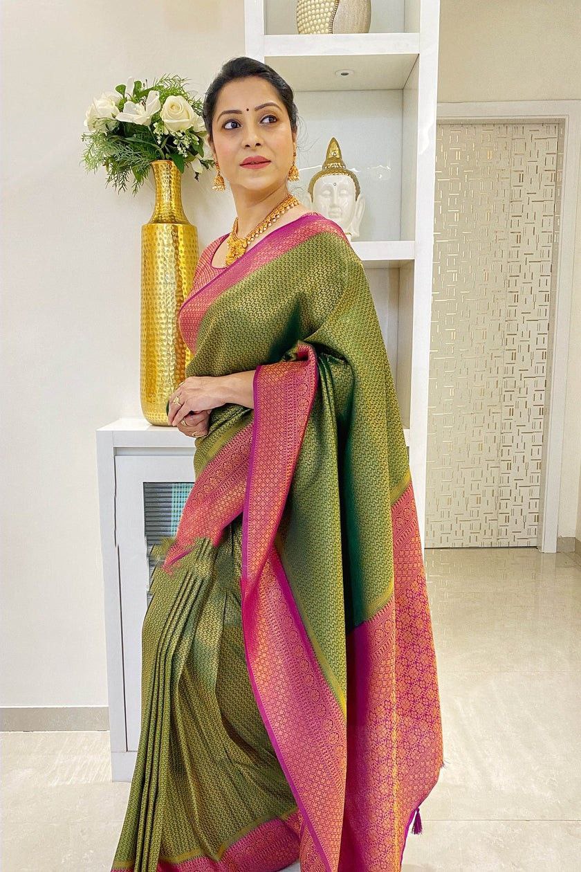 Outstanding Jaquard Dark Green Color Silk Saree