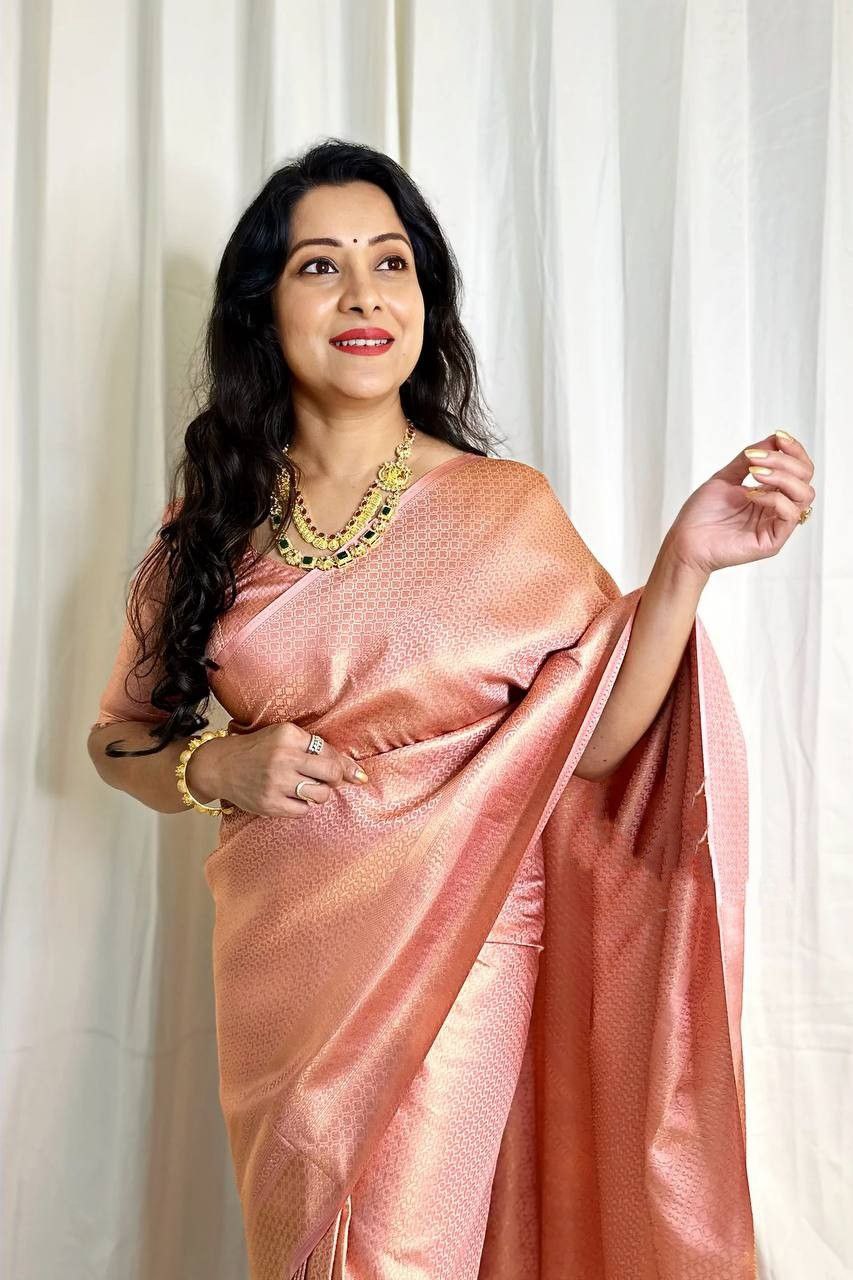 Outstanding Jaquard Peach Color Silk Saree