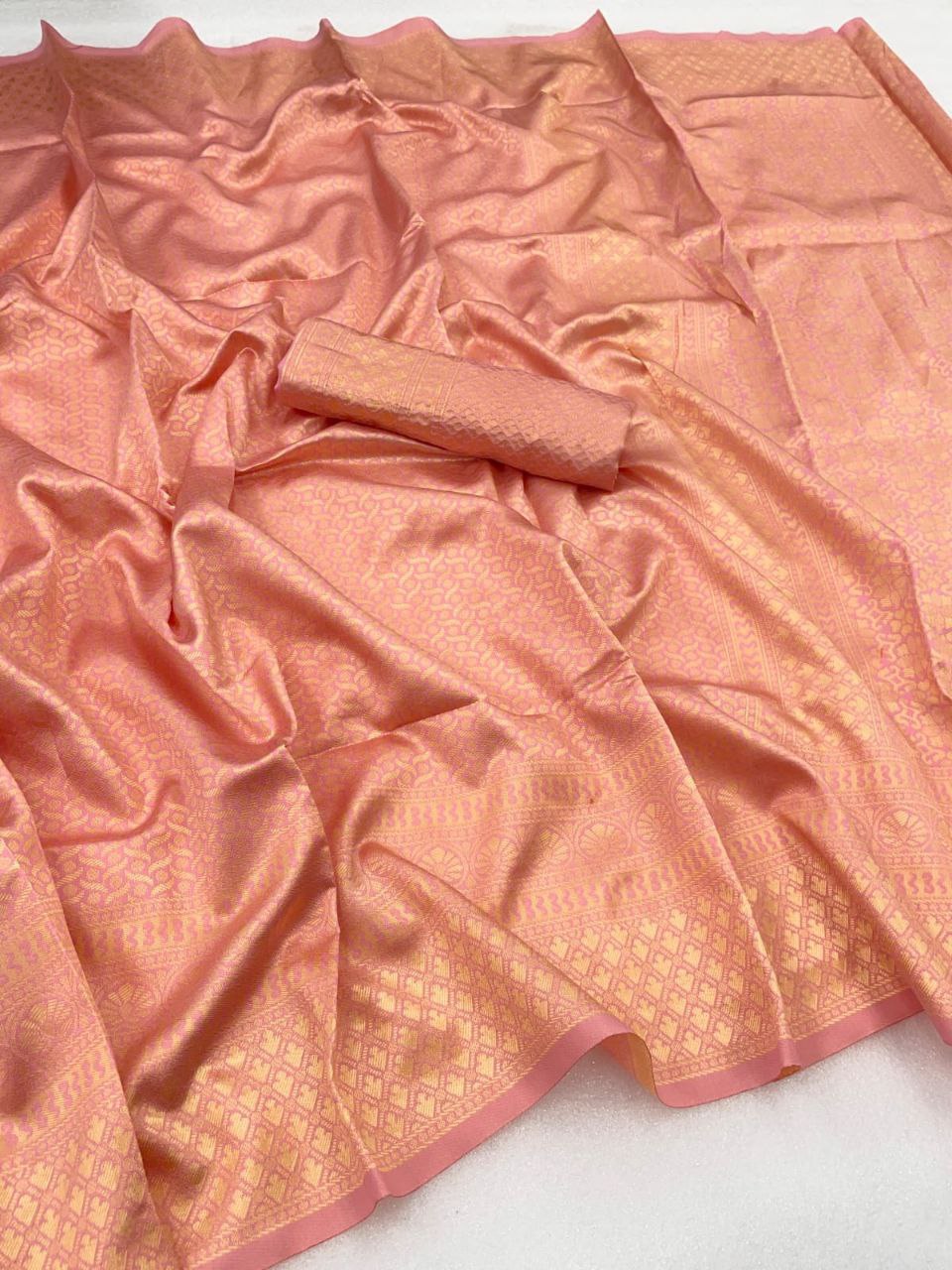 Outstanding Jaquard Peach Color Silk Saree