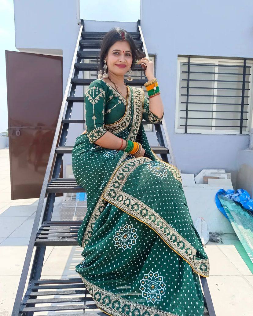 Exotic Bandhani Mehndi Wear Green Color Silk Saree