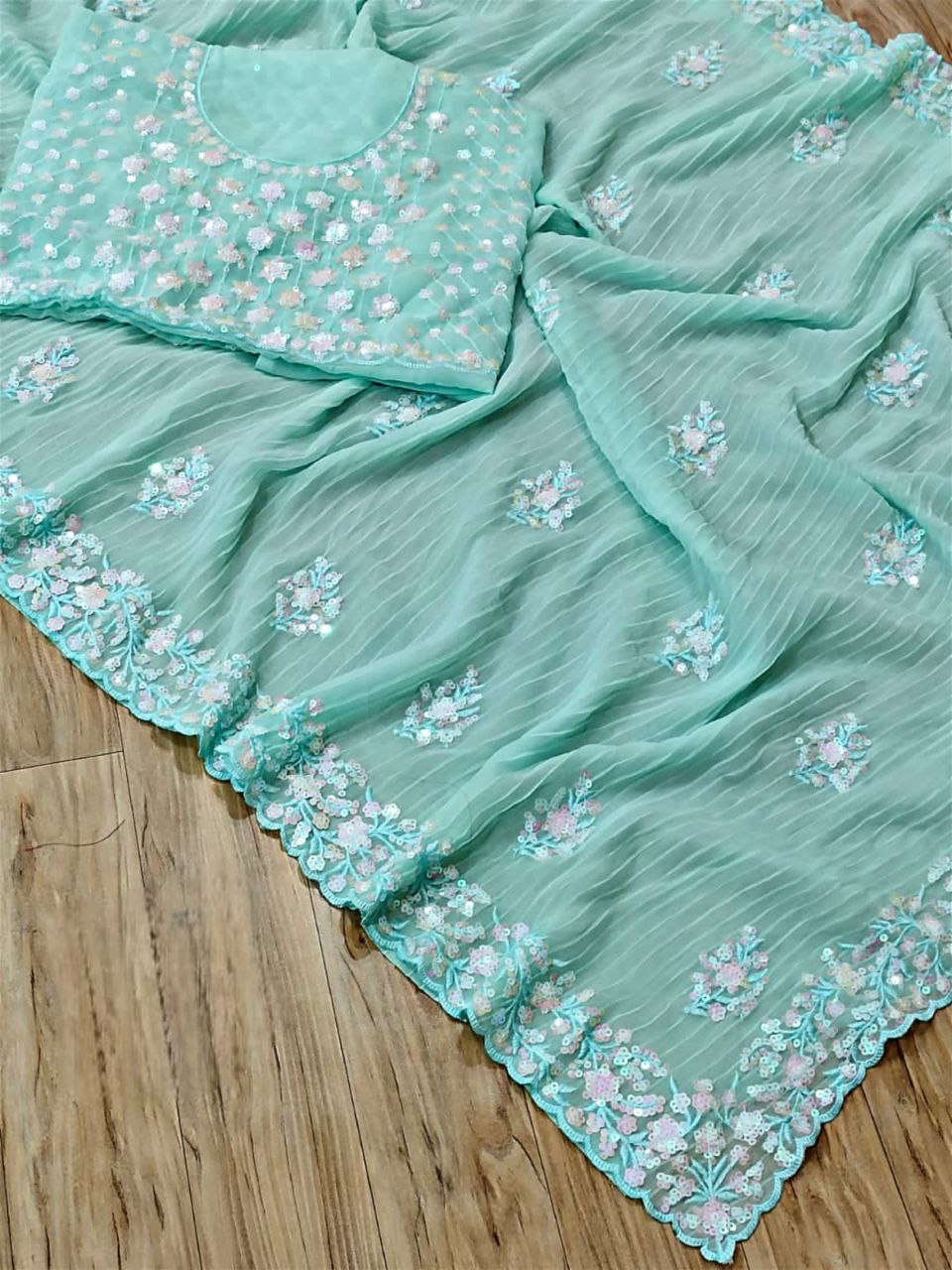 Graceful Sky Blue Color Georgette Saree